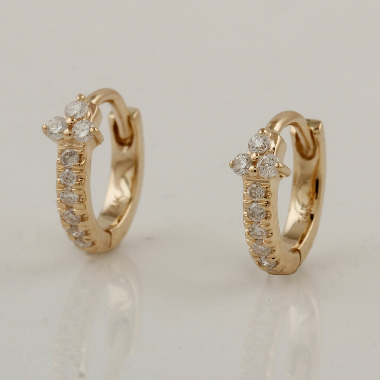 14 karat gold white diamond huggie earrings
